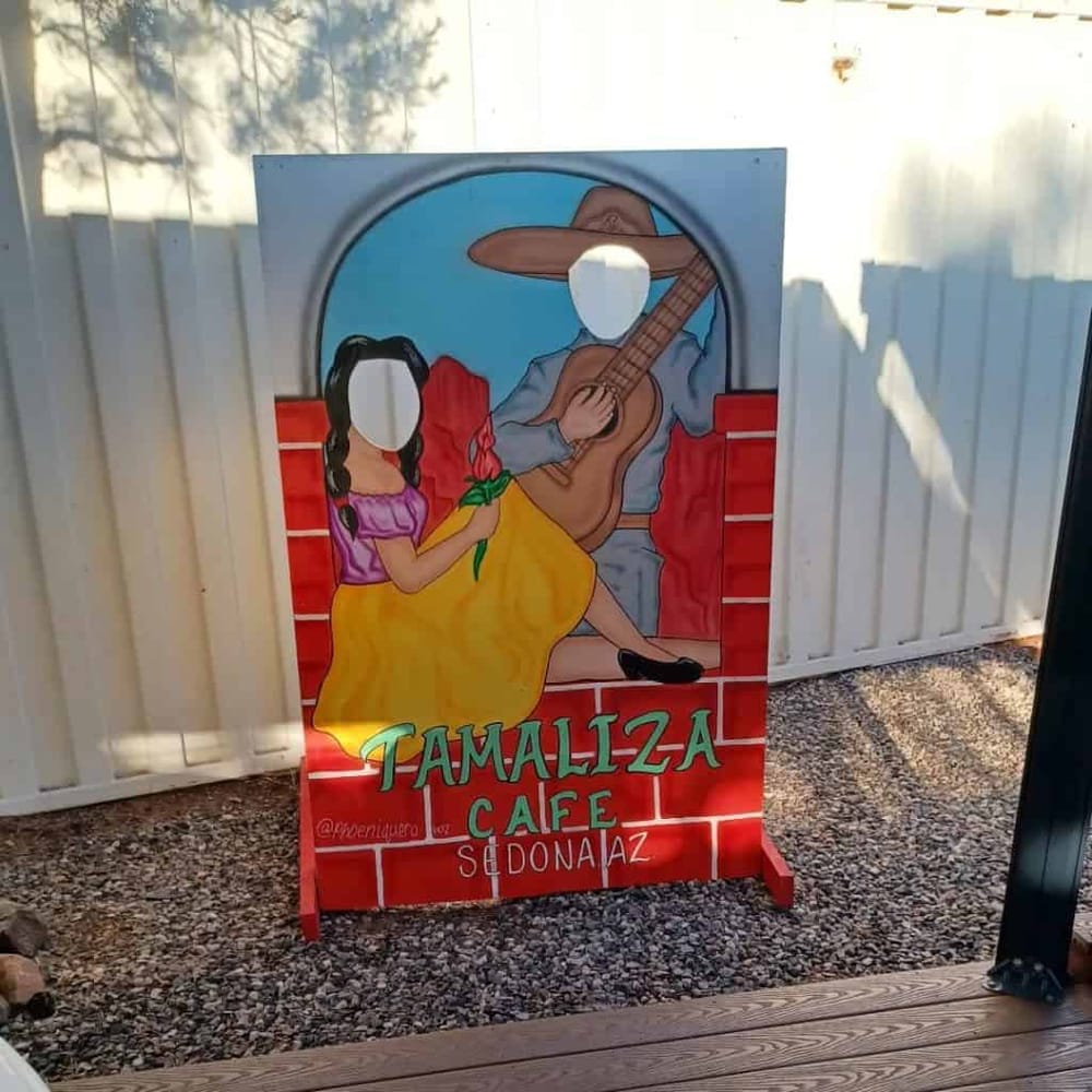 Colorful mural sign for Tamaliza Cafe Sedona AZ with traditional Mexican design.
