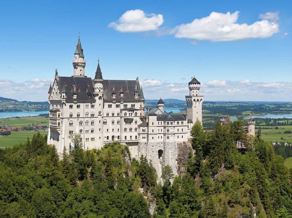 Fairy tale castle in Germany, popular tourist attraction, scenic landscape, historic European architecture.