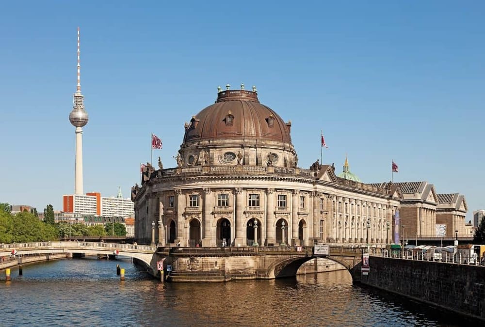 Historic Berlin Museum in Germany with Museum Island and TV Tower in background.
