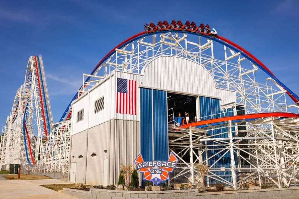 Thrilling roller coaster at Quest for Directions amusement park with vibrant colors and exciting ride experience.