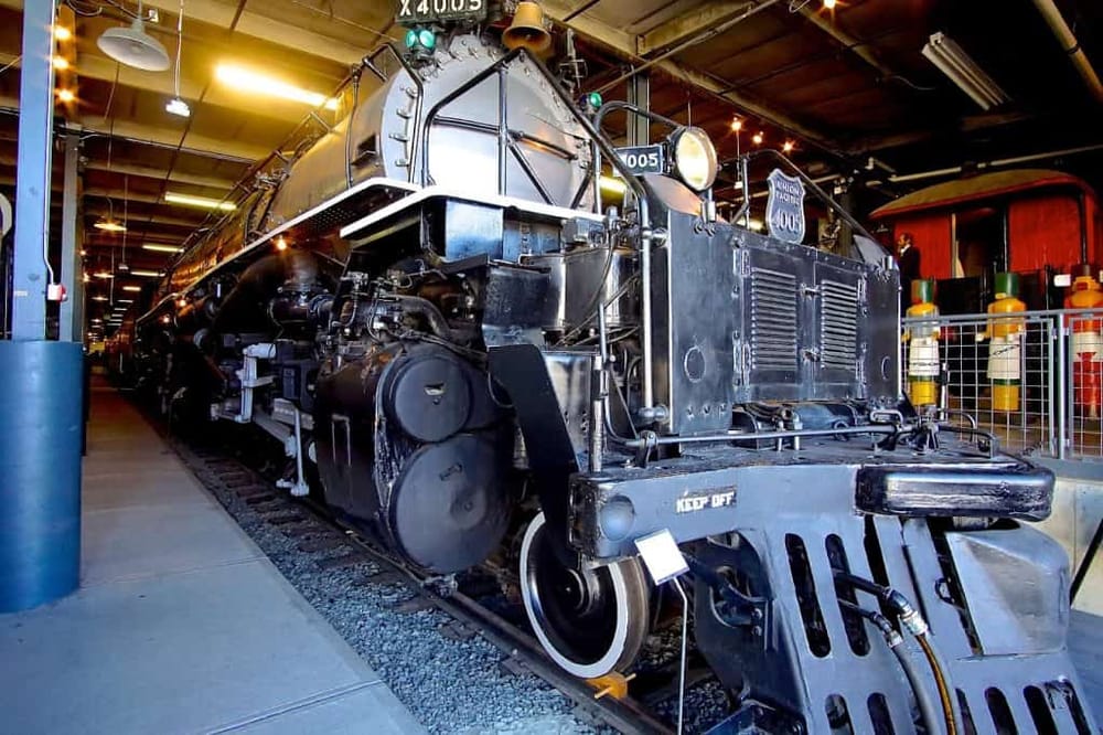 Vintage steam locomotive exhibit at Quest for Directions Museum, showcasing historic train engines and transportation history.