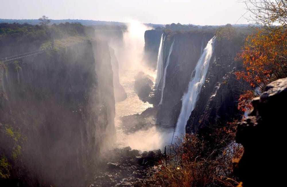 Breathtaking view of Niagara Falls showcasing cascading waterfalls and misty spray, iconic natural wonder for sightseeing and travel.