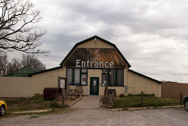 A-frame entrance building with tiger artwork, welcoming visitors to Quest for Directions.