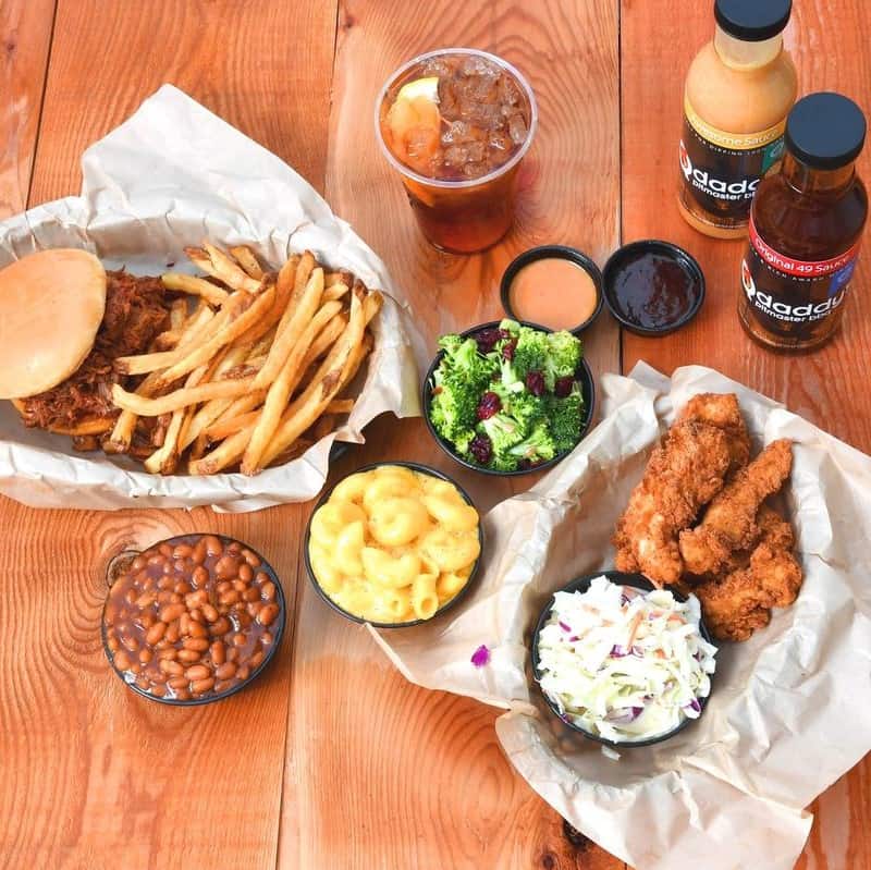 Juicy fried chicken with sides and beverages, ideal for home delivery or takeout from QuestForDirections.