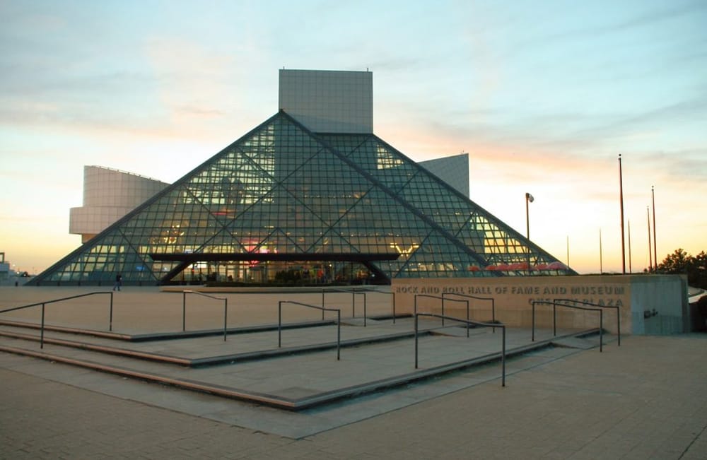 Modern glass building of the Rock and Roll Hall of Fame and Museum at sunset, Cleveland Ohio.