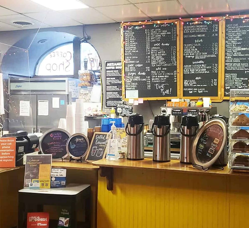 Cold Brew Coffee and Café Menu in a cozy coffee shop atmosphere.