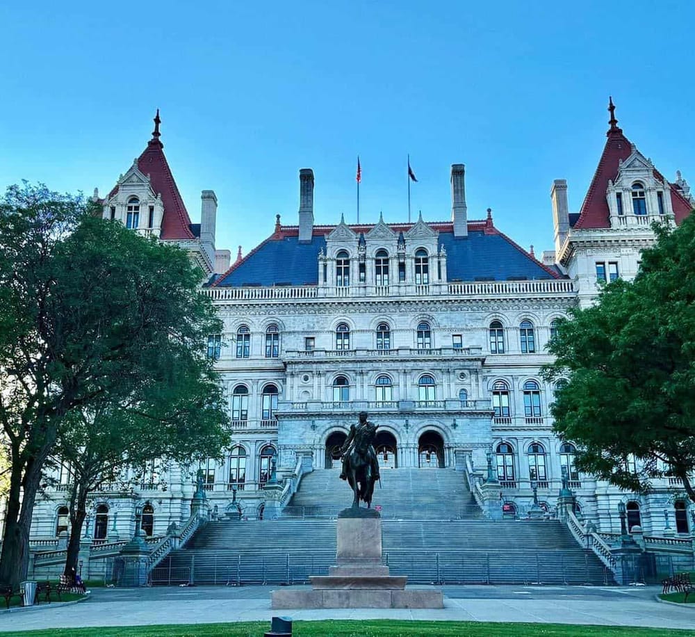 Historic state capitol building in Tallahassee, Florida, with impressive architecture and surrounding greenery.
