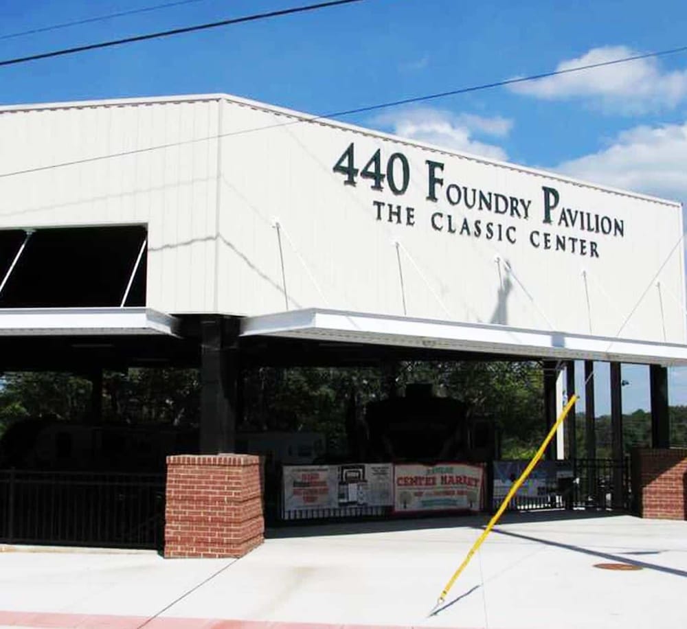 Historic building exterior with street view at QuestForDirections, classic center and foundry pavilion.