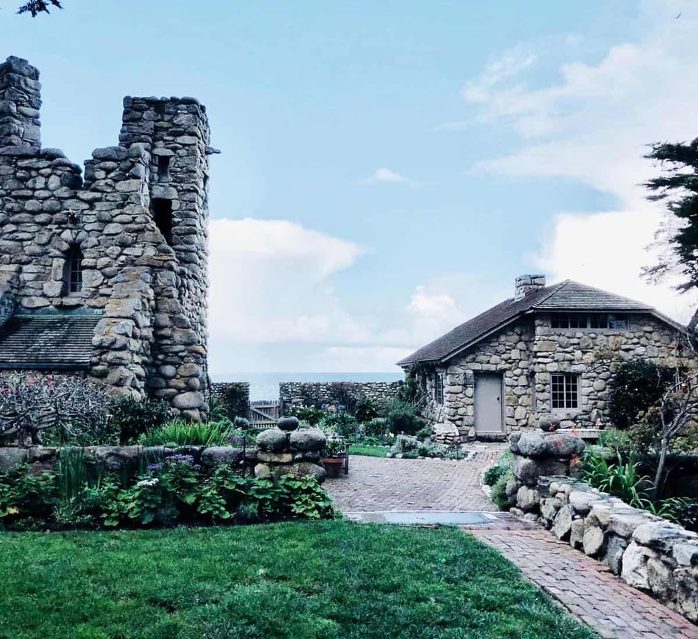 Rustic stone cottages with historic charm and scenic garden views.