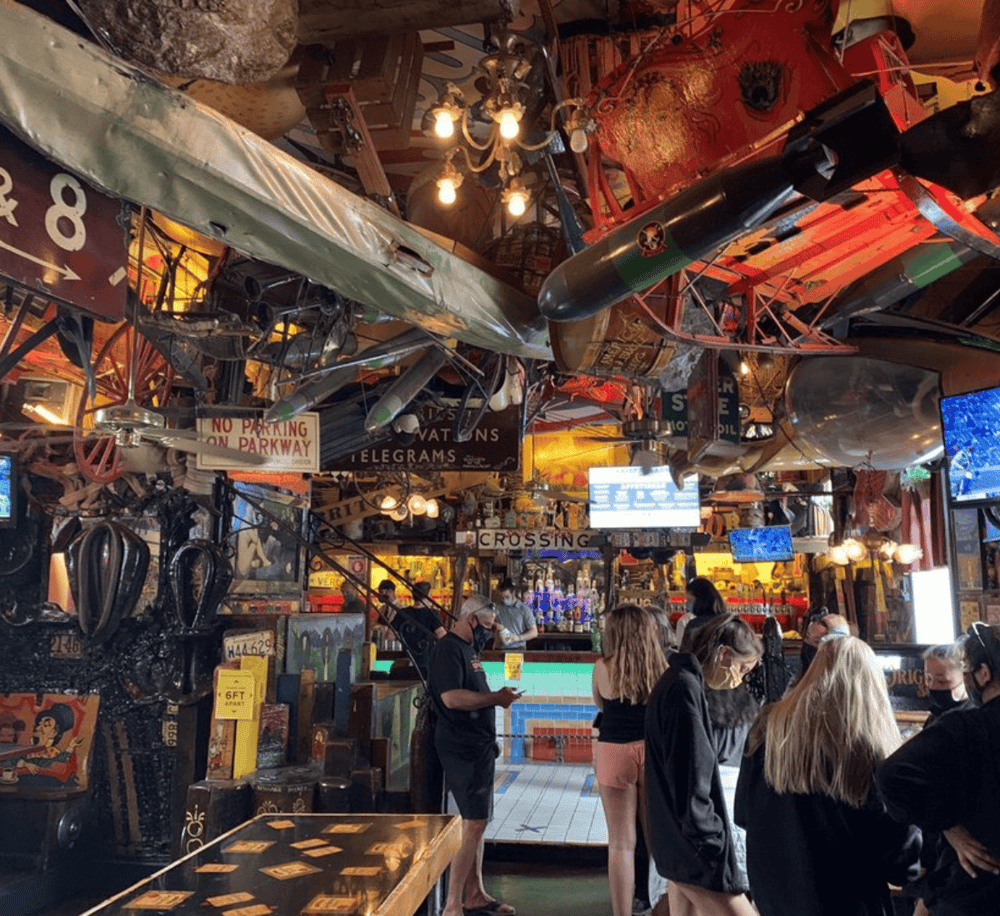 Airplane-themed decor with vintage aircraft and memorabilia at Quest For Directions.