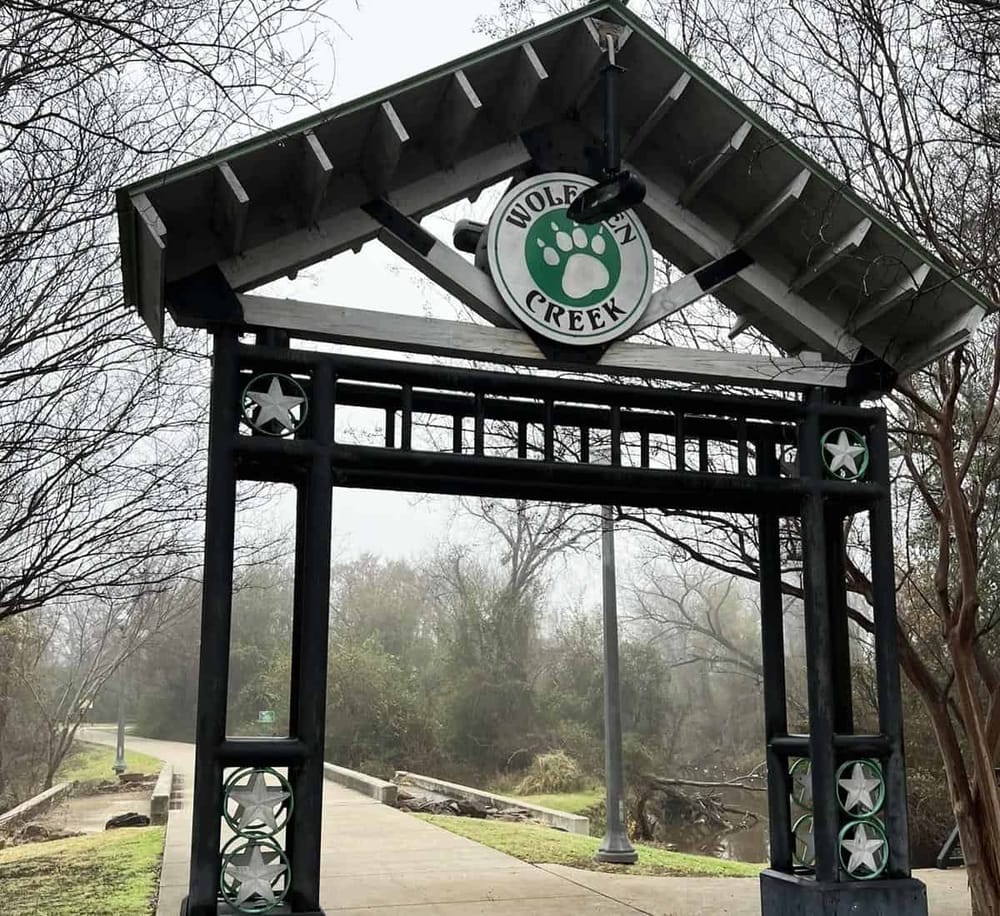 Wildlife trail entrance sign at Wolfson Creek park.
