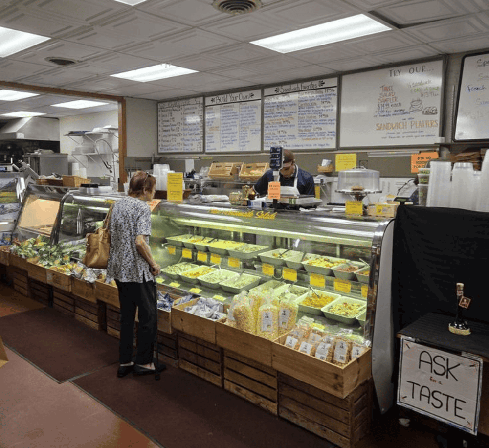 Fresh deli salads at local grocery store, friendly staff, great for quick meals.