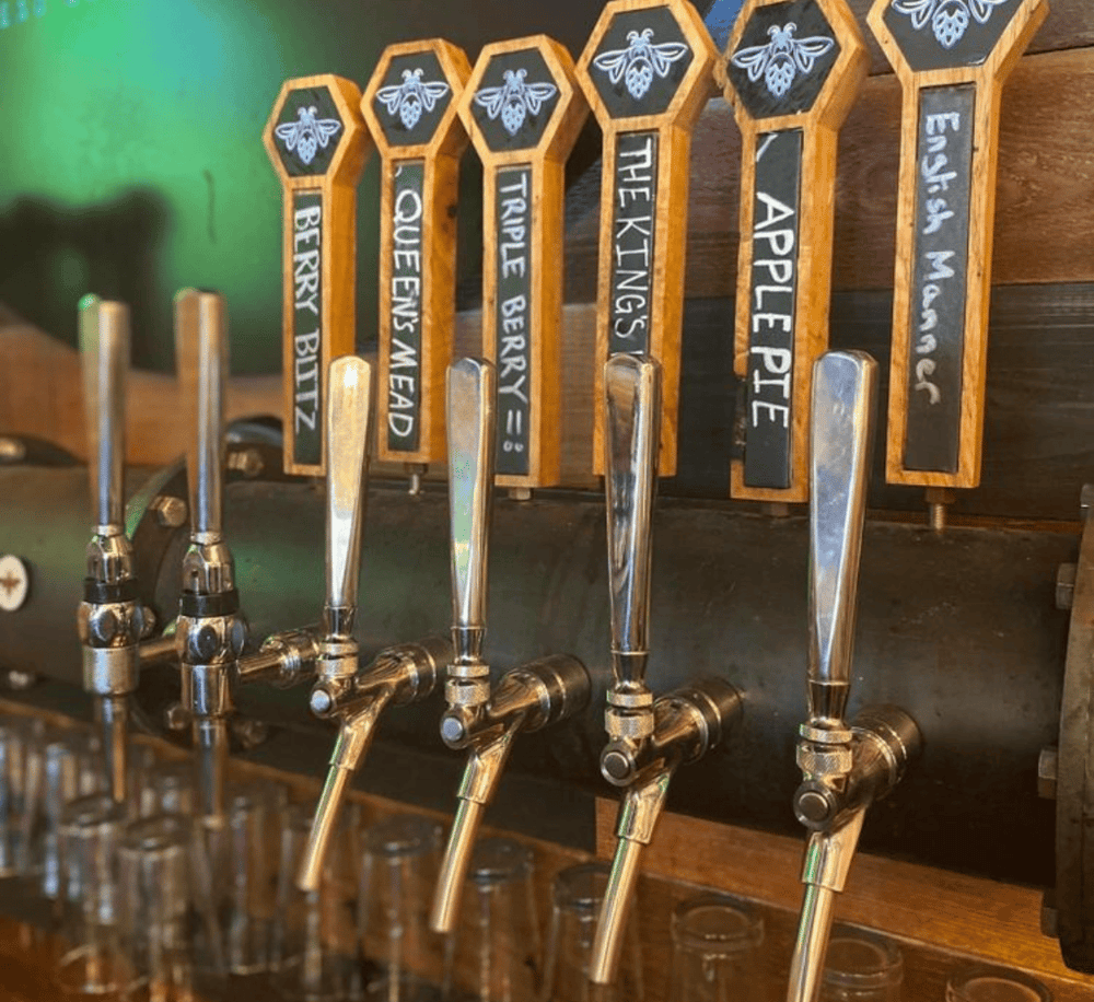 1. Beer taps with flavored options at Quest for Directions bar.