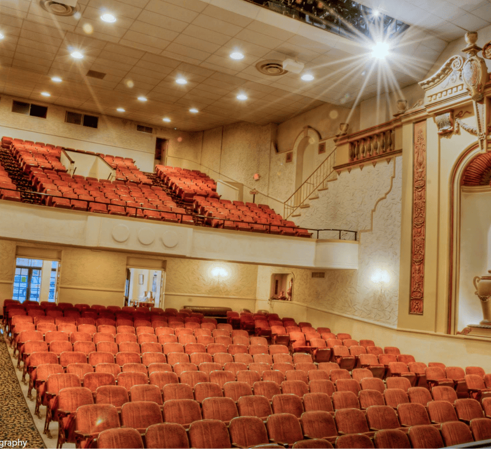 Auditorium seating with elegant ornate architecture, ideal for events or theater performances.
