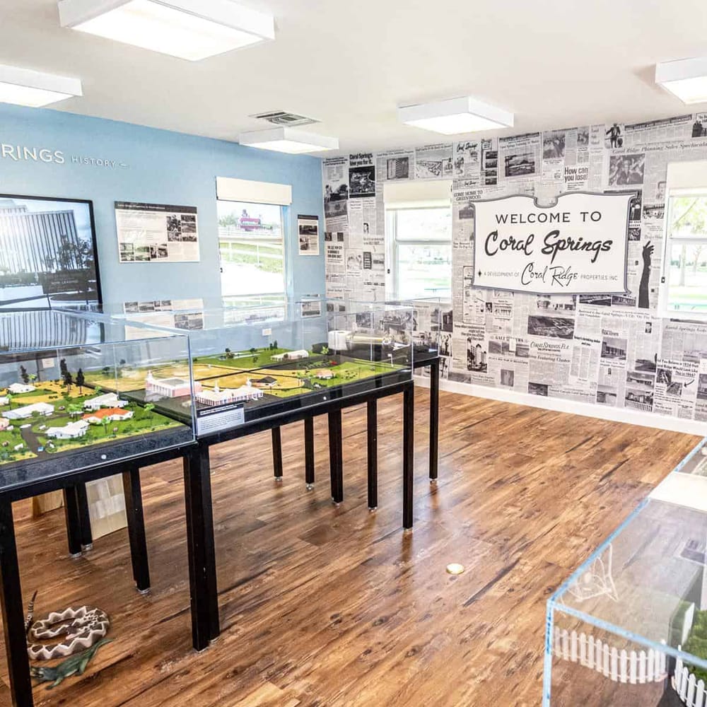 Model town exhibit at Coral Springs local history museum showcasing community development.