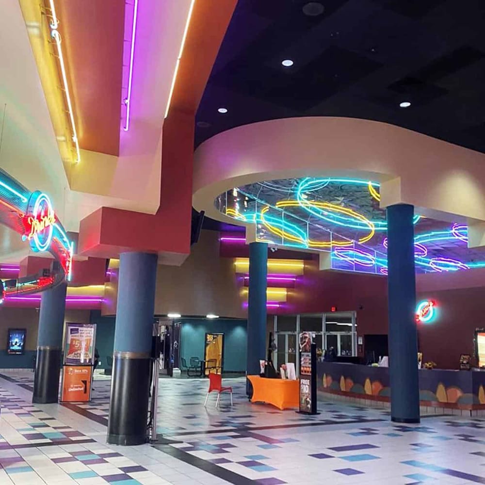 Colorful neon lights and modern architectural design at Quest For Directions.