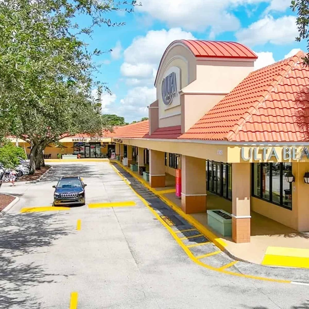 Convenient shopping plaza with retail stores and ample parking, perfect for easy errands and retail therapy.