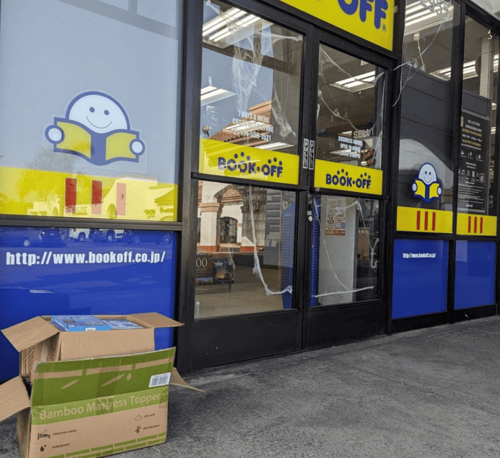 Smile logo reading a book, Book Off storefront, secondhand bookstore, Japanese book store chain, quest for directions, used books shop.