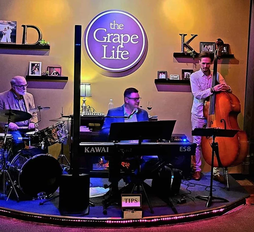 1. Live jazz band performing at The Grape Life, a popular wine and music venue.