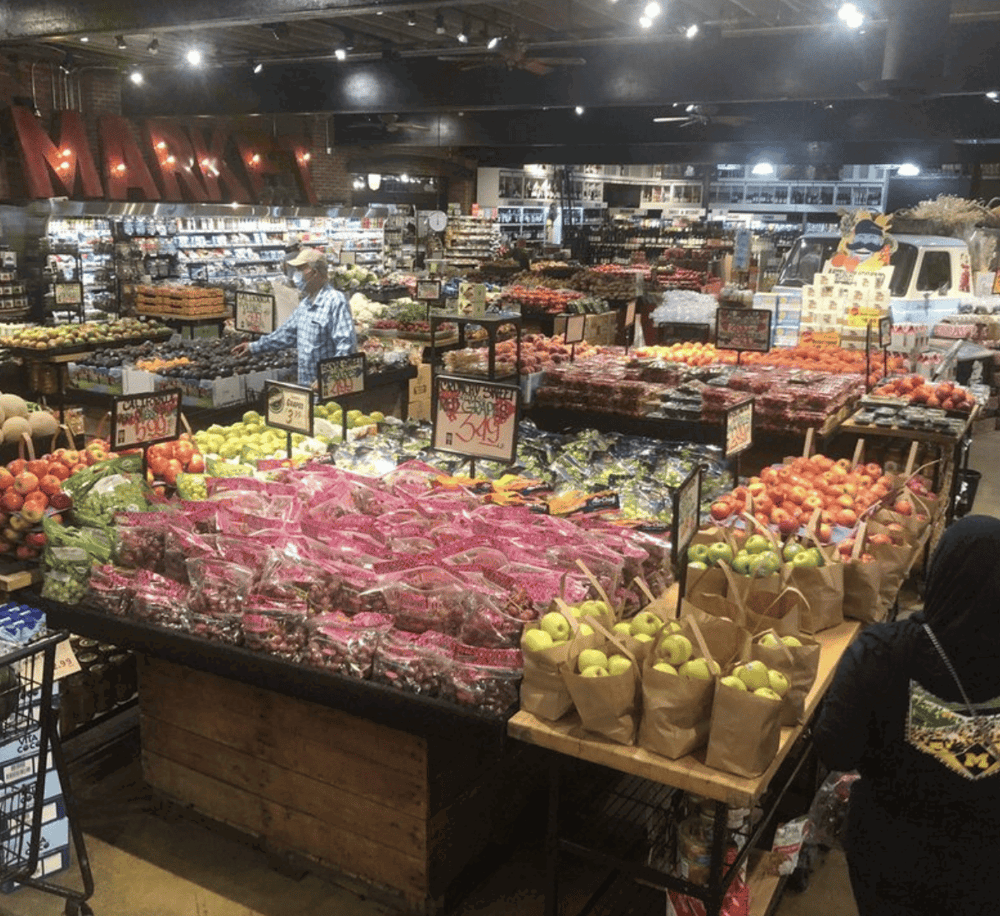 Fresh produce in a grocery store or farmers market, highlighting local food shopping options.
