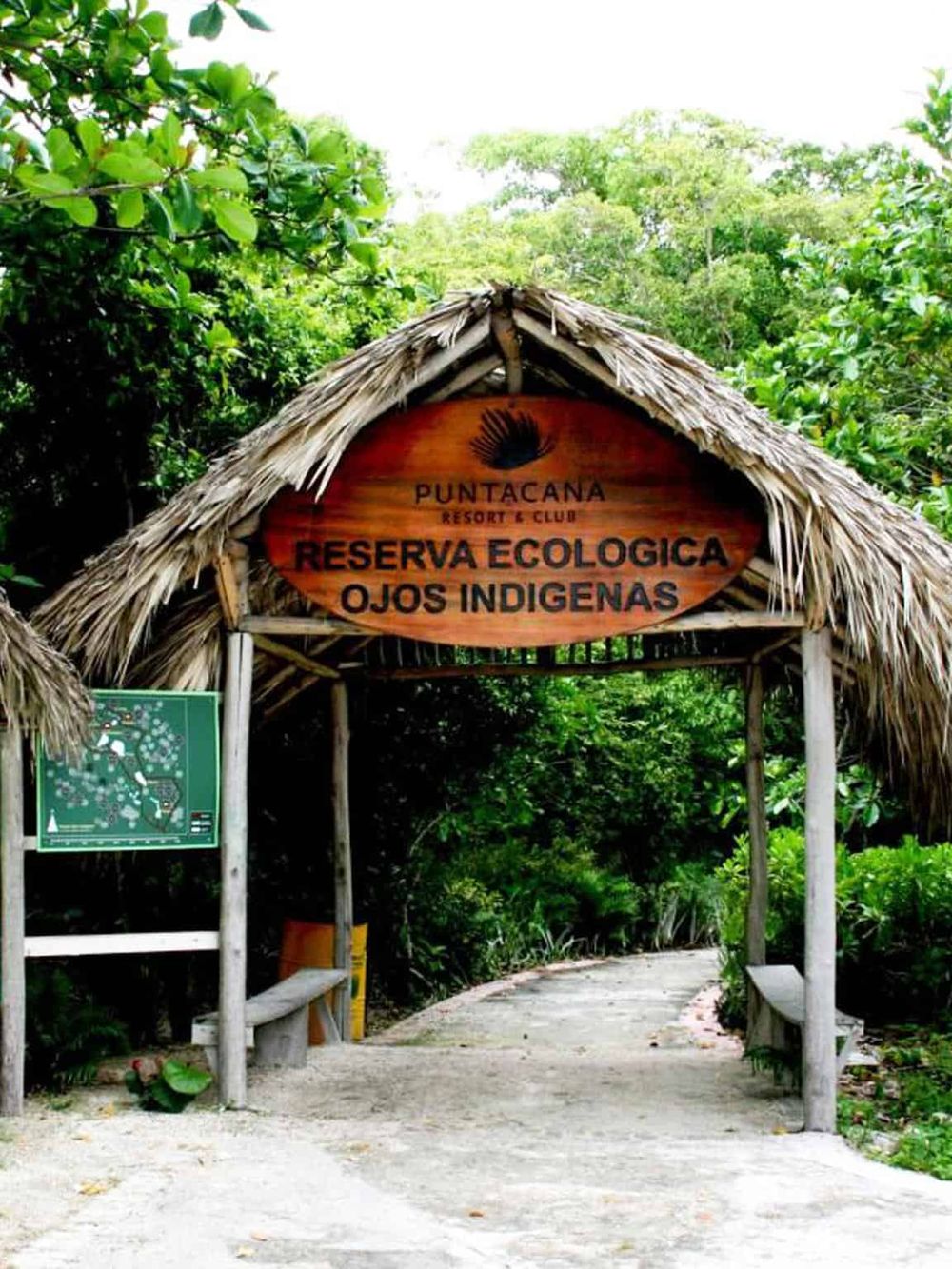 Eco-friendly nature reserve entrance in Punta Cana with indigenous wildlife conservation sign.