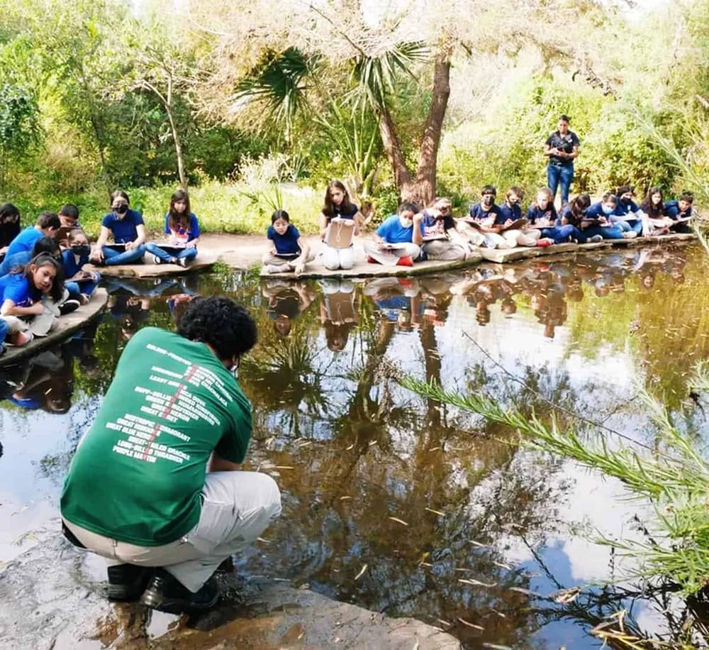Students participating in a nature educational program at QuestForDirections outdoor learning center.