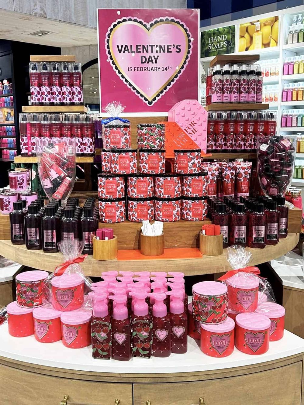 Pink Valentine’s Day gift display with bath and skincare products at QuestForDirections.