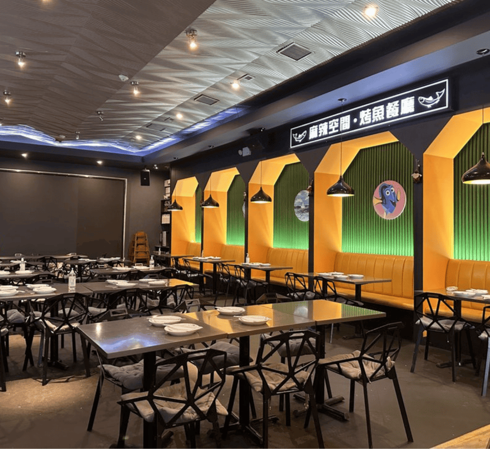 Modern Asian restaurant interior with vibrant colors and stylish design, perfect for dining and social gatherings.