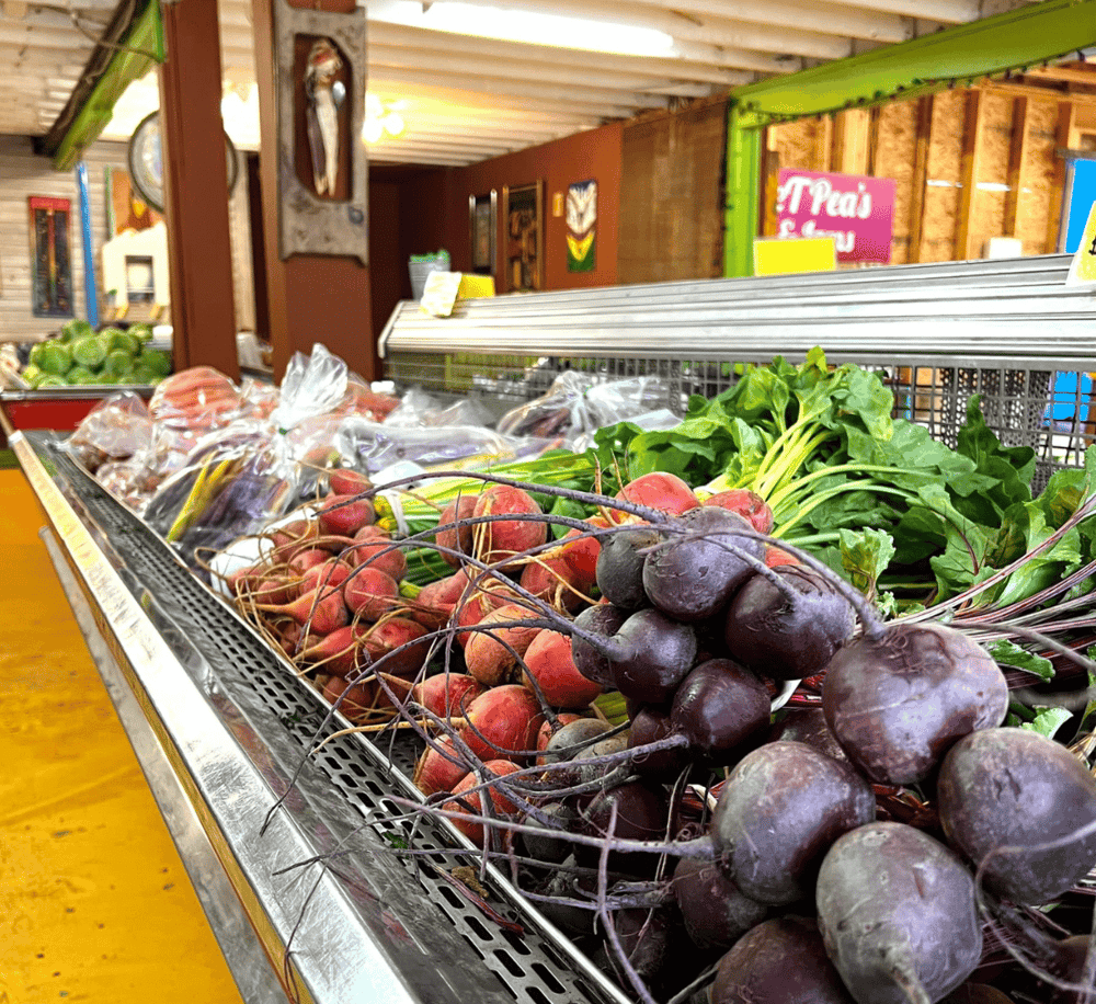 Fresh beets and radishes at local farmers market for healthy eating and organic vegetables.