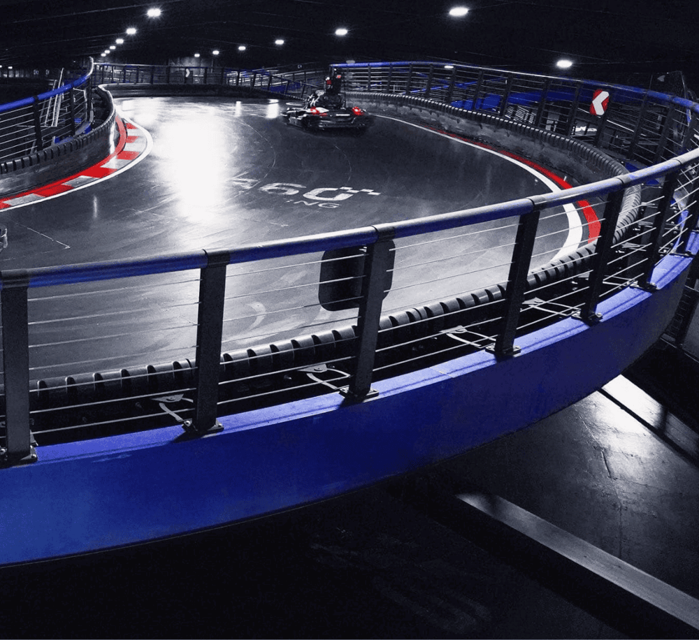 Remote-controlled go-kart racing track at QuestForDirections entertainment center.