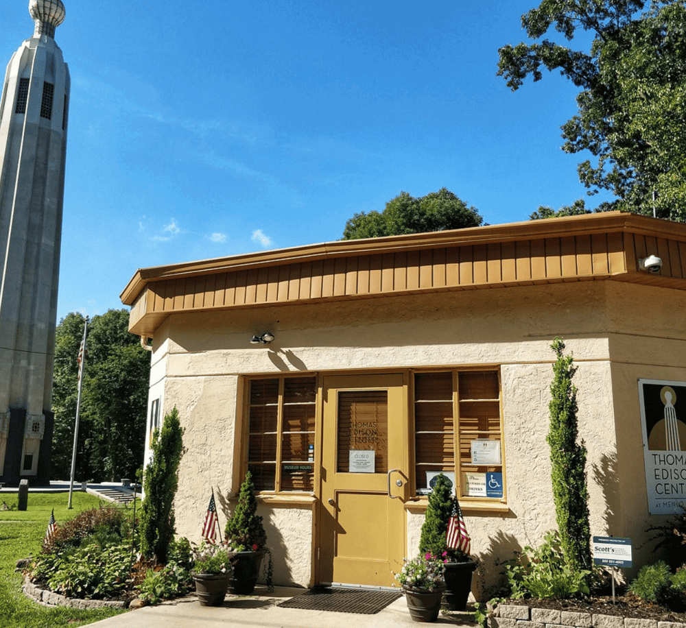 Guided tour office at Thomas Edison Center, featuring historical exhibits and visitor information.