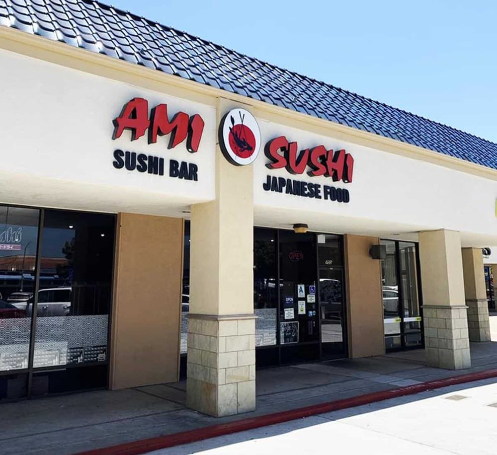 1. Sushi restaurant with Japanese food, sushi bar, and modern exterior design.