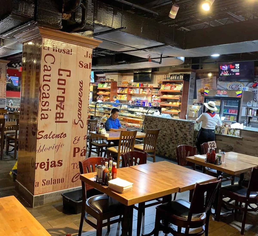 Authentic Mexican restaurant interior with cozy seating, vibrant decor, and a variety of delicious traditional dishes.