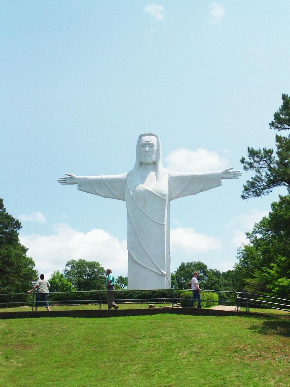 Large Christ the Redeemer statue in Brazil, iconic landmark, outdoor tourist attraction, beautiful skyline backdrop.