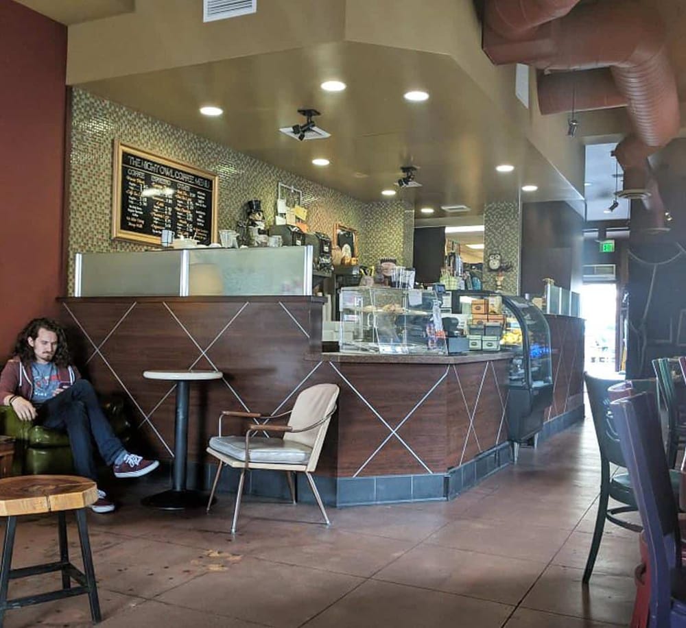 Cozy coffee shop interior with modern decor and a relaxed atmosphere.