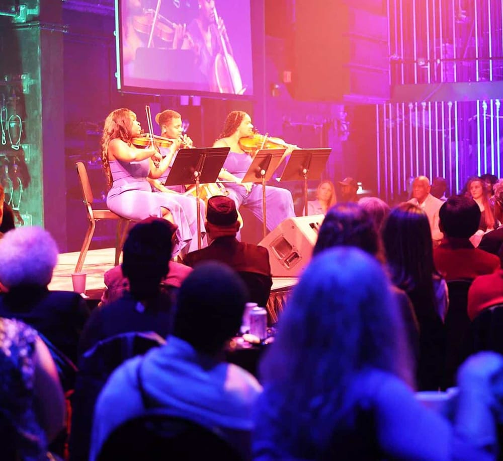 Elegant live jazz performance at QuestForDirections event, showcasing musical entertainment and community engagement.