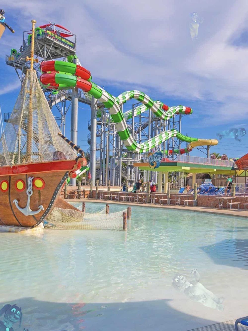 Water park with water slides and pirate-themed attraction, perfect for family fun and adventure.