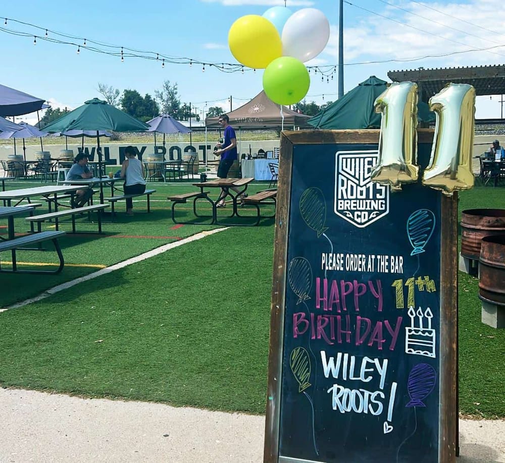 1. Vibrant outdoor brewery celebration for Wiley Roots Brewing's 11th birthday.