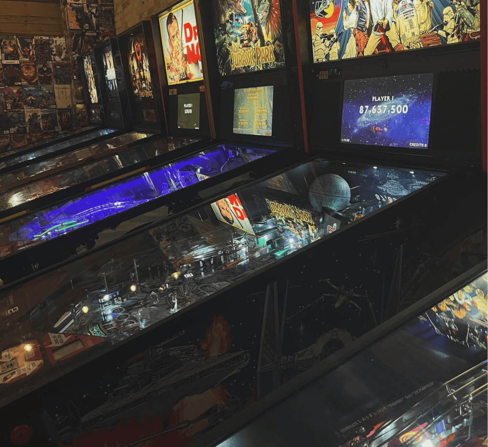 Blinker pinball machine with iconic arcade game visuals and vibrant lighting.