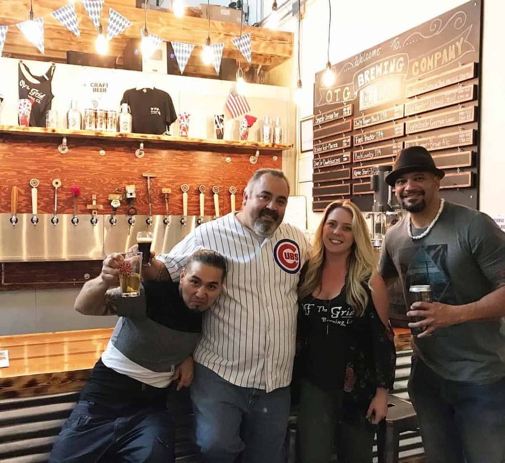 Chicago craft beer friends celebrating at a local brewery.