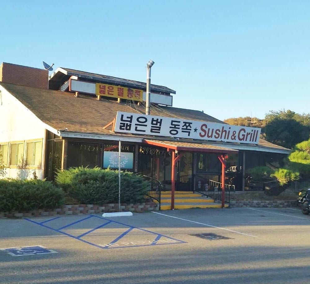Quiet sushi and grill restaurant with outdoor seating and parking.