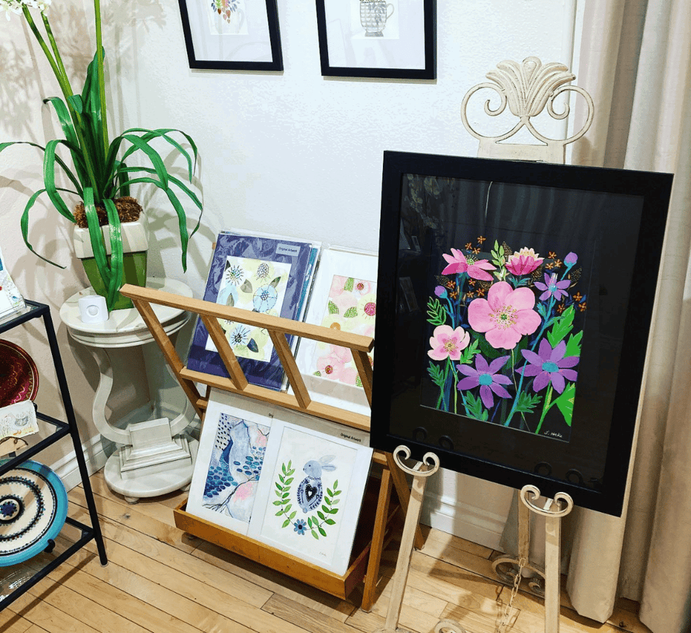 Colorful floral artwork displayed at QuestForDirections art gallery event.