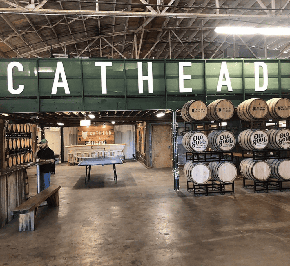 Vintage distillery interior with barrels at QuestForDirections.
