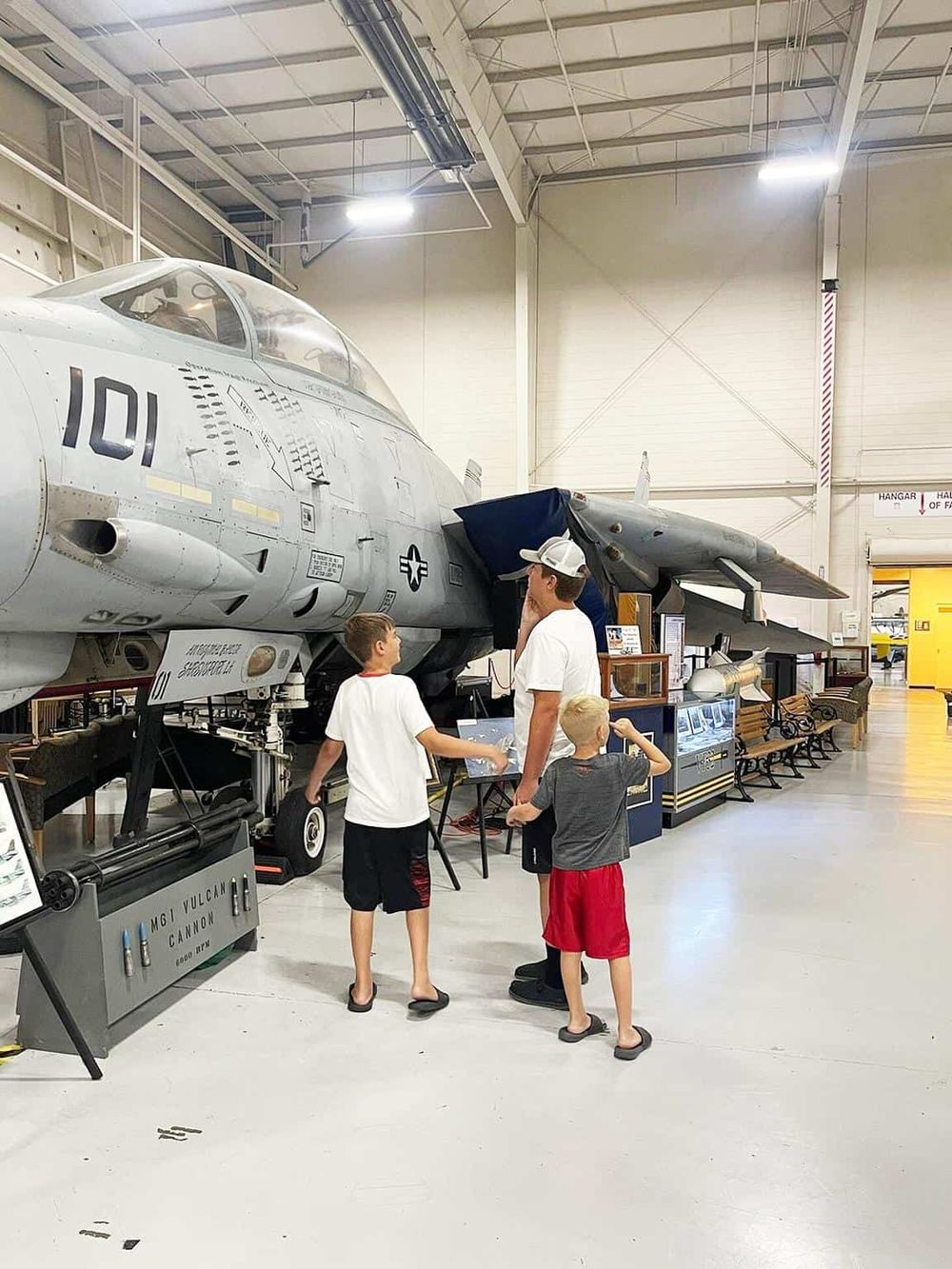 Vintage fighter jet aircraft at aerospace museum for educational exploration.