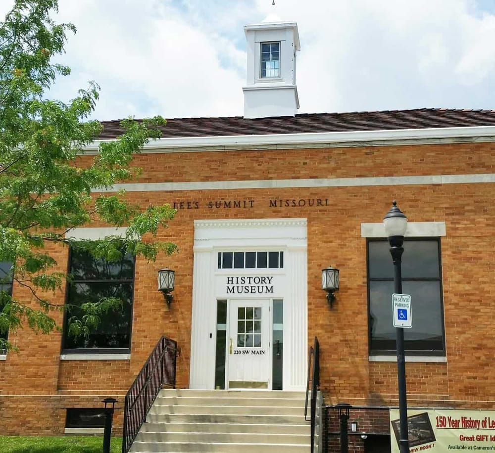 Historic Lee's Summit Missouri History Museum entrance with brick facade and classic street lamp.