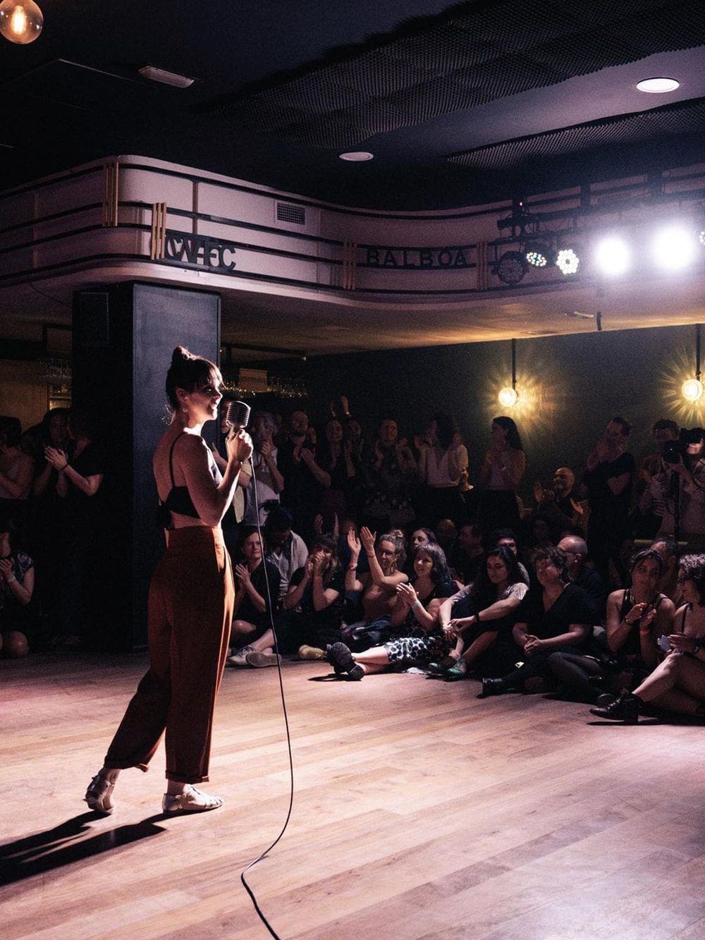 Live comedy performance at QuestForDirections. Engaging show with an enthusiastic audience in a cozy venue.