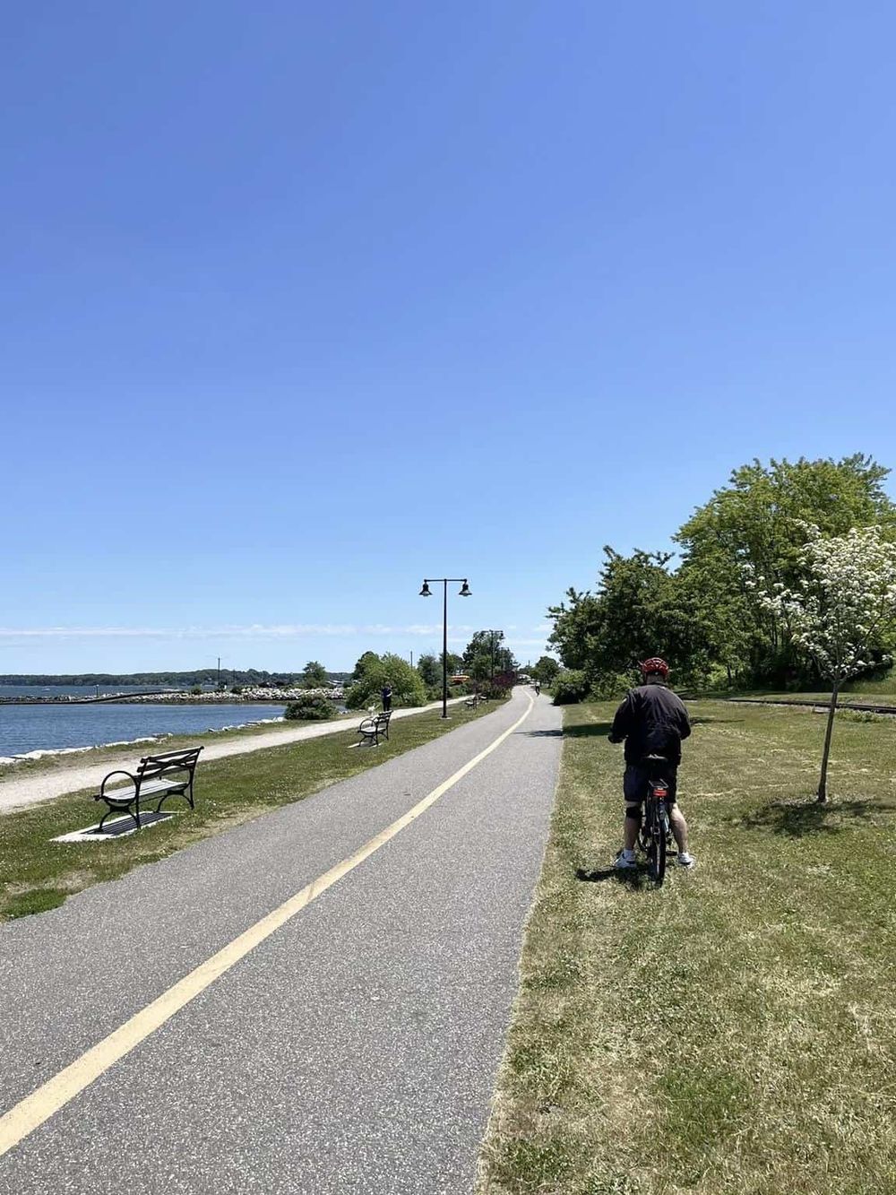 Scenic lakeside biking trail for outdoors and navigation enthusiasts on QuestForDirections.