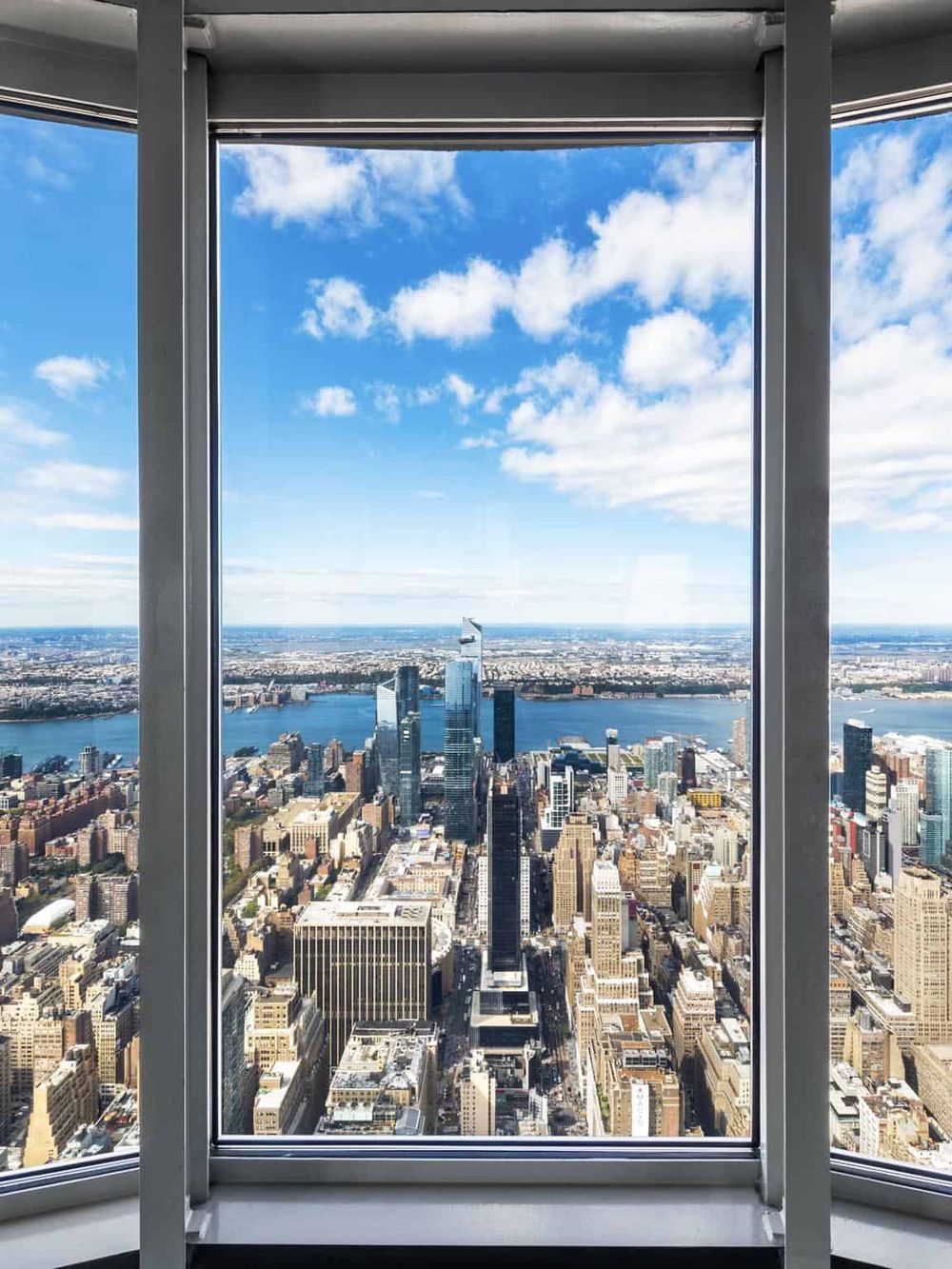 Breathtaking city skyline view from a high-rise building overlooking Manhattan, New York City.