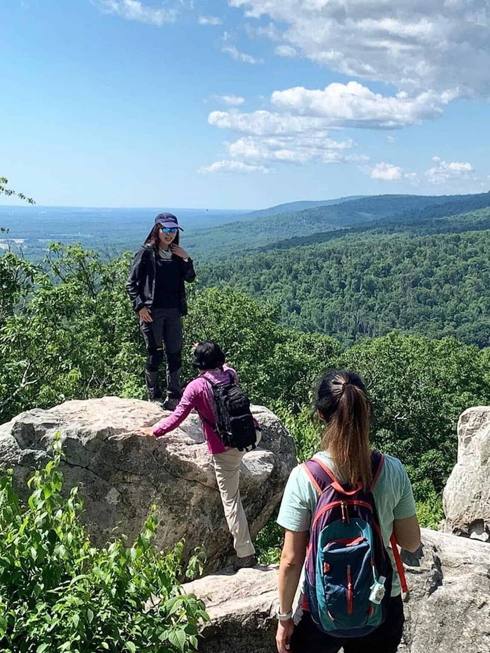 Enjoying scenic mountain views during a hiking adventure in nature.