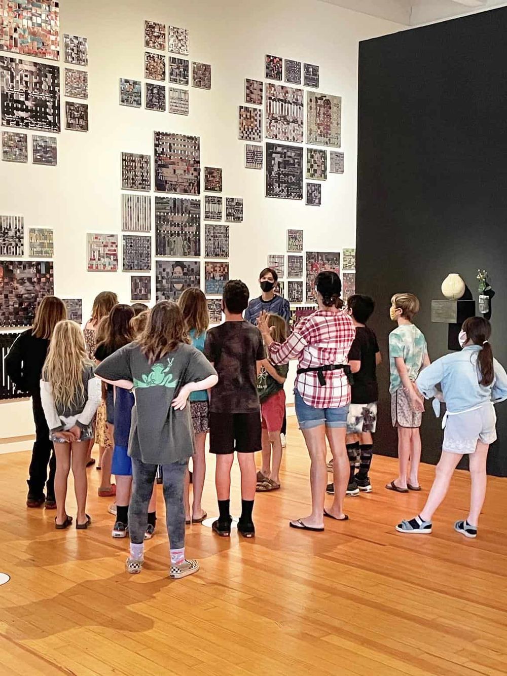 Colorful mosaic art display at QuestForDirections museum in Tulsa, featuring interactive tours for visitors.